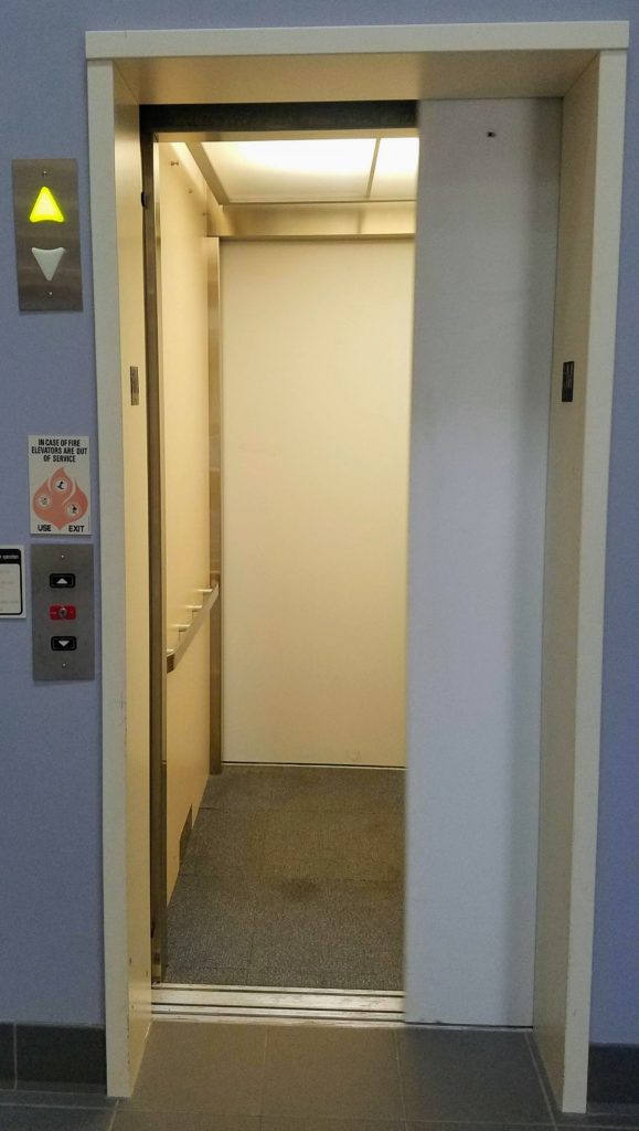 Fairplain's elevator with the door partway open.